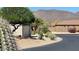 Scenic street view featuring desert landscaping, a home, and mountain views in the background at 18375 E San Ignacio Ct, Gold Canyon, AZ 85118