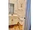 Bathroom featuring a toilet, vanity with sink, and decorative deer head on the wall at 20502 W Ridge Rd, Buckeye, AZ 85396