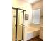 Modern bathroom features a glass-enclosed shower, separate soaking tub, and natural light at 20502 W Ridge Rd, Buckeye, AZ 85396