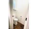 Powder room with toilet and tile flooring is brightly lit at 20502 W Ridge Rd, Buckeye, AZ 85396