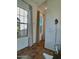 Bright entryway with large windows, neutral-toned curtains, and tile flooring at 20502 W Ridge Rd, Buckeye, AZ 85396
