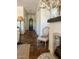 Inviting foyer features tile floors, high ceilings, and stylish decor at 20502 W Ridge Rd, Buckeye, AZ 85396