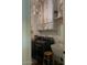 Well-organized laundry room boasts overhead cabinets, washer, dryer, and sink at 20502 W Ridge Rd, Buckeye, AZ 85396