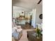 Open-concept living space with a view of the kitchen, creating an inviting and connected atmosphere at 20502 W Ridge Rd, Buckeye, AZ 85396