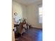 The home office has hardwood flooring and a brightly lit window at 20502 W Ridge Rd, Buckeye, AZ 85396