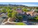 Breathtaking aerial view showcasing the home and its surroundings, with mountain views at 20518 W White Rock Rd, Buckeye, AZ 85396