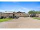 Expansive backyard with a charming gazebo, shed, and ample space for outdoor activities at 20518 W White Rock Rd, Buckeye, AZ 85396