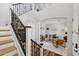 Welcoming entryway with staircase and a glimpse into the living area at 20518 W White Rock Rd, Buckeye, AZ 85396
