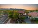 Beautiful two-story home with a red tile roof, a balcony and an attached garage at 20518 W White Rock Rd, Buckeye, AZ 85396
