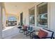 Cozy front porch with comfortable seating and decorative touches at 20518 W White Rock Rd, Buckeye, AZ 85396
