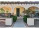 Inviting front porch with seating area and decorative accents at 20518 W White Rock Rd, Buckeye, AZ 85396