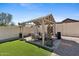 Backyard gazebo provides an idyllic spot for outdoor gatherings and relaxing in style at 20518 W White Rock Rd, Buckeye, AZ 85396