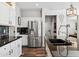 Well-lit kitchen featuring stainless steel appliances, dark granite countertops, and modern subway tile backsplash at 20518 W White Rock Rd, Buckeye, AZ 85396