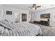 Bedroom featuring neutral colors, soft bedding, and an ensuite bathroom at 20518 W White Rock Rd, Buckeye, AZ 85396