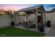 Outdoor living area with seating area and pergola at 20518 W White Rock Rd, Buckeye, AZ 85396