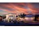 Charming home featuring a well-manicured front yard and a two-car garage at 22837 E Orchard Ln, Queen Creek, AZ 85142