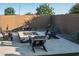 Inviting backyard firepit with modern Adirondack chairs, perfect for outdoor entertaining at 22837 E Orchard Ln, Queen Creek, AZ 85142