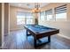 Bright game room with a pool table, recessed lighting, and large windows at 22837 E Orchard Ln, Queen Creek, AZ 85142