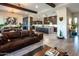 Open-concept living room with a kitchen, seamlessly connecting living spaces at 22837 E Orchard Ln, Queen Creek, AZ 85142