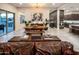 Open living space with kitchen view, dining area, and a modern kitchen with stainless steel appliances at 22837 E Orchard Ln, Queen Creek, AZ 85142