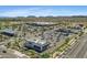 Aerial view showcases a neighborhood with a variety of shopping centers and local businesses at 2511 W Blue Sky Dr, Phoenix, AZ 85085