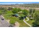 Scenic aerial view of a neighborhood park with picnic areas, walking paths, and lush green spaces at 2511 W Blue Sky Dr, Phoenix, AZ 85085