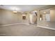 Open-concept living area showcasing the staircase and connection to the kitchen at 2614 E Carob Dr, Gilbert, AZ 85298
