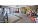 Spacious garage interior with concrete floors and double doors to the outside at 2921 N 103Rd Ave, Avondale, AZ 85392