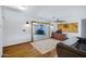 Spacious room with hardwood floors, rustic decor, and open design at 2921 N 103Rd Ave, Avondale, AZ 85392