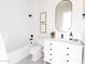 Chic bathroom with modern vanity, framed mirror, and walk-in shower, complete with stylish fixtures at 3330 S Horizon Pl, Chandler, AZ 85248