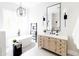 Bright bathroom with a freestanding tub, double vanity, large mirror, and modern fixtures at 3330 S Horizon Pl, Chandler, AZ 85248