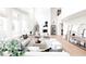 Bright living room with soaring ceilings, a fireplace, and elegant decor at 3330 S Horizon Pl, Chandler, AZ 85248