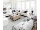 Bright and airy living room featuring multiple seating areas, modern decor, and large windows at 3330 S Horizon Pl, Chandler, AZ 85248