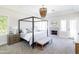 Spacious main bedroom features a four-poster bed, decorative chandelier, fireplace, and a neutral color palette at 3330 S Horizon Pl, Chandler, AZ 85248