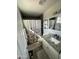 Cozy bathroom with a shower-tub combo, white vanity with granite countertop, and elegant floral shower curtain at 3615 E Hearn Rd, Phoenix, AZ 85032