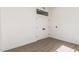 Bright bedroom showcasing hard floors and a paneled entry door at 3851 E San Pedro Ave, Gilbert, AZ 85234