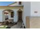 Inviting front entrance with arched porch, desert landscaping, and visible house number at 3851 E San Pedro Ave, Gilbert, AZ 85234