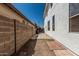 Narrow side yard featuring desert landscaping and block wall at 3851 E San Pedro Ave, Gilbert, AZ 85234