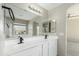 A luxurious bathroom offers dual sinks and a soaking tub at 3910 W Goldmine Mountain Dr, San Tan Valley, AZ 85144