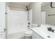 This bathroom features a shower and white vanity sink at 3910 W Goldmine Mountain Dr, San Tan Valley, AZ 85144