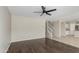 Spacious living room featuring staircase access to upper level at 3910 W Goldmine Mountain Dr, San Tan Valley, AZ 85144