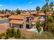 Aerial view of neighborhood showcasing desert landscaping, tile roofs, and a community pool, ideal for outdoor living at 4043 E Mountain Vista Dr, Phoenix, AZ 85048