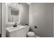 Bathroom with a modern vanity, white toilet, and decorative mirror at 4043 E Mountain Vista Dr, Phoenix, AZ 85048