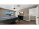 Cozy bedroom featuring a bed, window with a view, and mounted TV at 4043 E Mountain Vista Dr, Phoenix, AZ 85048