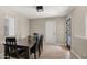 Dining room features a dark wood table with seating and great natural light at 4043 E Mountain Vista Dr, Phoenix, AZ 85048