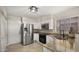 Well-equipped kitchen boasts stainless steel appliances, granite countertops, and ample cabinet space at 4043 E Mountain Vista Dr, Phoenix, AZ 85048