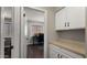Office space with a view, complemented by built-in cabinetry for organized storage adjacent to the entrance at 4043 E Mountain Vista Dr, Phoenix, AZ 85048
