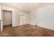 A cozy bedroom featuring a textured wall and a window letting in natural light at 4648 N 40Th St, Phoenix, AZ 85018