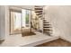 Bright entryway with large windows, spiral staircase, and tile flooring at 4648 N 40Th St, Phoenix, AZ 85018