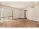 Living room showcasing carpet and a door at 4648 N 40Th St, Phoenix, AZ 85018